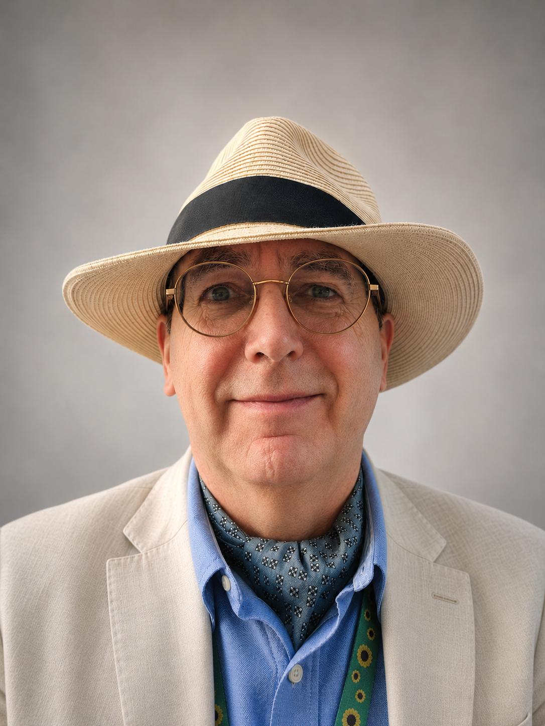 The eponymous author himself. Pete Little (me) In cream linen suit, cream panama hat , blue shirt and signature cravat.