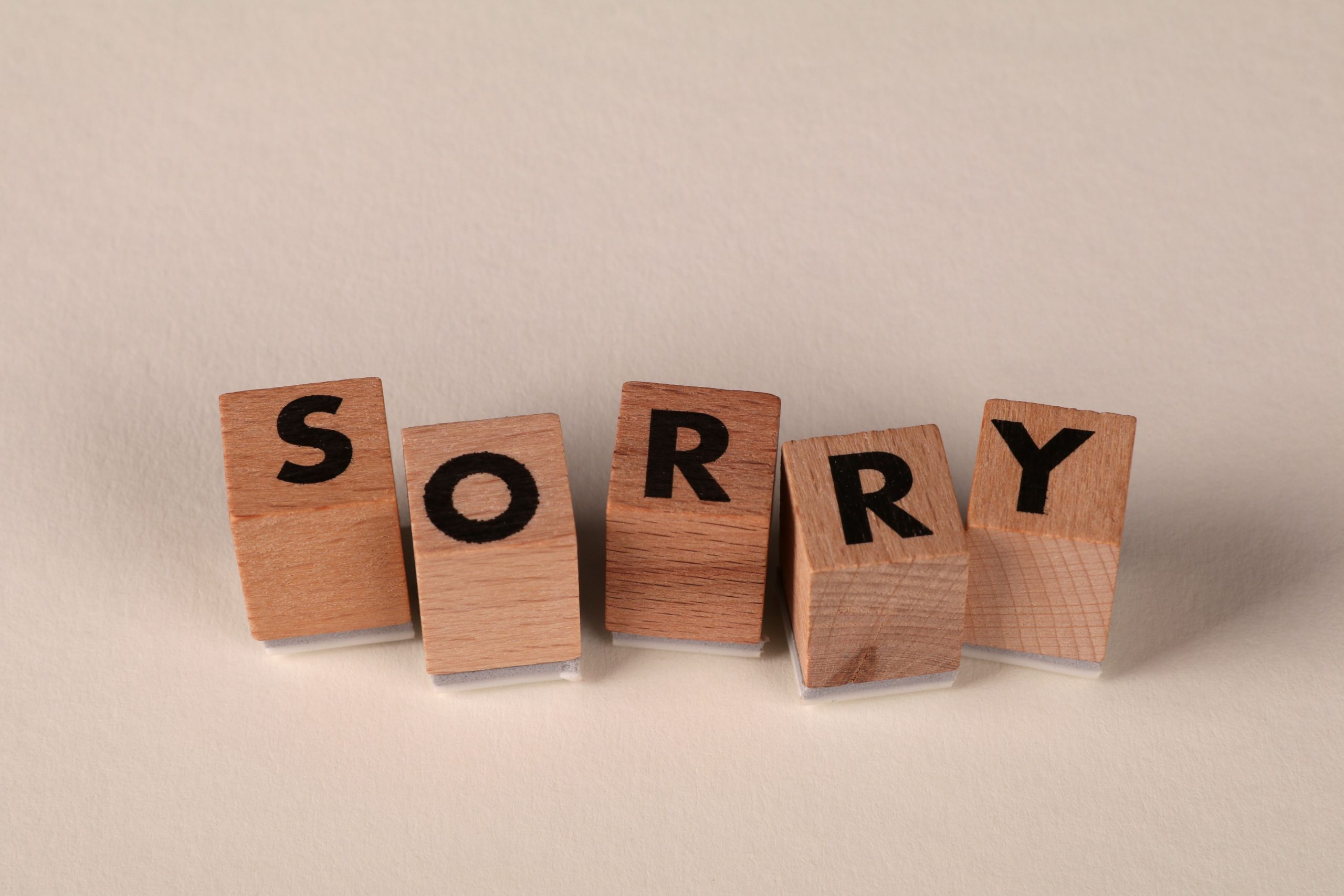 Wooden Letter blocks spelling out the word SORRY
